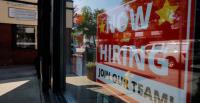 U.S. job growth surges in August, keeping Fed hike in play