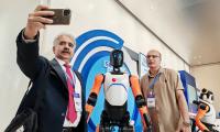 Foreign guests take on robots in tug-of-war, won over by tech charm in South China
