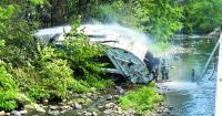 FLAMING GARBAGE TRUCK CRASHES INTO PEQUABUCK: Two sent to hospital with serious injuries after crash