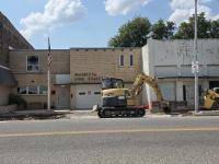 Sidewalk construction halts short of expectations