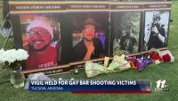 Vigil held for gay bar shooting victims in Arizona