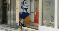 "To die in Cuba is a simple procedure... a line we stand in silence," laments the Cuban poet