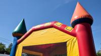 Two primary school children injured after being thrown from bouncy castle in Australia