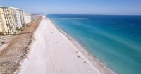 A pristine Florida Gulf Coast beach town may soon get a boardwalk. Locals are fuming.