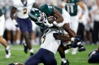 Michigan State survives injuries to key starters in season-opening win