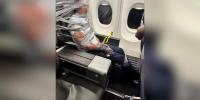 Passenger arrested after being restrained with duct tape, zip ties during American Airlines flight, reports say