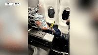 Unruly passenger strapped with duct-tape, zip ties before flight diverted to Baltimore New images show the disruptive passenger who forced an American Airlines flight from DFW to EWR to divert to Baltimore restrained with duct tape.
