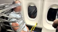 American Airlines passenger duct-taped and zip-tied after midair racist and homophobic meltdown