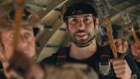 Michigan congressional hopeful leaps from plane in first TV ad