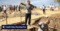 Competitors dig deep at Hungarian gravedigging contest