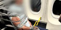 'Violent' passenger duct-taped to seat after 'choking' fellow traveller on board chaotic flight