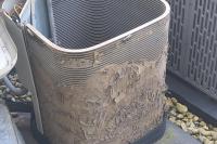 New homeowner fighting 'extreme' energy use finds years of buildup choking AC condensers