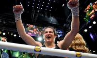 Katie Taylor is crowned undisputed champion for a THIRD time with unanimous decision victory over Flora Pili - as Irish boxing icon, 40, enjoys fairytale end to her career in front of 82,000 fans at sold-out Croke Park