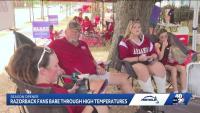 Arkansas fans brave extreme heat to celebrate Hogs' season opener