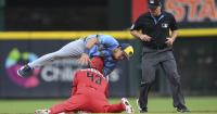 Brewers' 9th-inning rally bid falters as Reds even series after lengthy weather delay