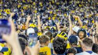 Will Big Ten fine Michigan for storming field? Conference's rules