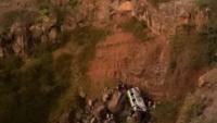 At least 20 dead & several seriously injured after bus carrying schoolchildren plunges 100ft into rocky ravine