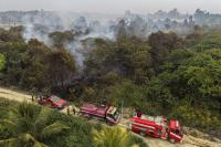Indonesia uses water bombing to contain wildfires near future capital