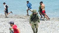 Over 20 Ceuta migrants arrested for ‘attacking soldiers with rocks’ as Trump blasts Spain for ‘zero control’ over crisis