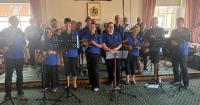 Cream tea and music afternoon raises hundreds for local service