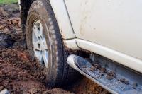Arizona driver, 88, and dog rescued from monsoon mud after phone's SOS text reveals location