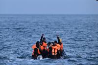 Britain intercepted a boat carrying 140 illegal migrants in the English Channel