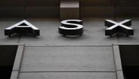 Australian shares flat as oil surge continues