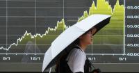 Asian shares are mixed as chipmaker shares rally in Tokyo and Seoul