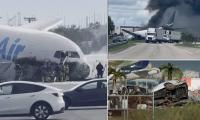 Dramatic footage shows rescue crews climbing into Amazon cargo plane that overshot runway in Miami as airport faces scrutiny for not using hidden safety system