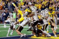 Michigan hits a Hail Mary, avoids ‘epic loss’