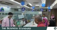 Sammilito Islami Bank begins deposit returns, greets customers with flowers