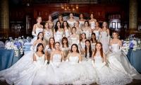 This season's diamonds! Young affluent debutantes gather in a sea of white gowns and glittering tiaras for the annual Queen Charlotte's Ball