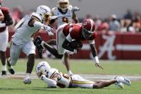 Alabama OC Preaches Sliding for QB Russell