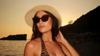 Champions League beauty Eva Murati strips to skimpy leopard print bikini on beach