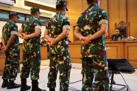 Indonesian activists criticize reduced sentences of soldiers convicted of acid attack on activist
