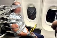 Duct-Taped American Airlines Passenger Loses Real Estate Job After Violent First-Class Flight Meltdown