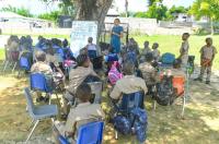 Hot classroom tent abandoned at Holland Primary Students, teachers turn to trees for shade