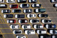 Japanese carmakers brace for profit hit after yen strengthens