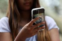Australia proposes hefty fines for big tech over duty to protect young users
