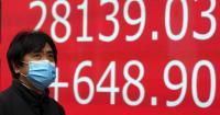 Asian stocks mixed as oil prices press higher