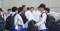 N. Korean athletes arrive in Beijing en route to Asian Games in Japan