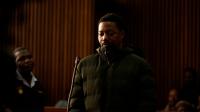 Man wanted over killings of wife and daughters in UK pleads guilty to gun offenses in South Africa