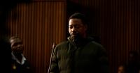 Man wanted over UK deaths of wife and daughters appears in court in South Africa
