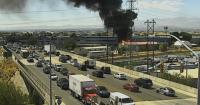 Large fire burns once again at Salt Lake City recycling center