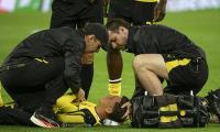Borussia Dortmund star rushed to hospital after slumping to the pitch with 'circulatory problems' during Champions League tie