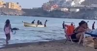 Migrant taxi boat arrives at popular beach before nine men jump off and wade ashore