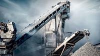 How are cement companies tapping into green energy to lower operational costs?