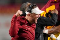 Giant juice boxes have USC football team sipping sweet sideline energy
