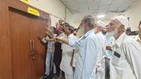 Civil society members hold prayers outside room housing defunct X-Ray machine at GMC Rajouri