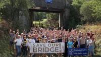 Campaigners rally against National Highways plan to infill historic Hertfordshire bridge